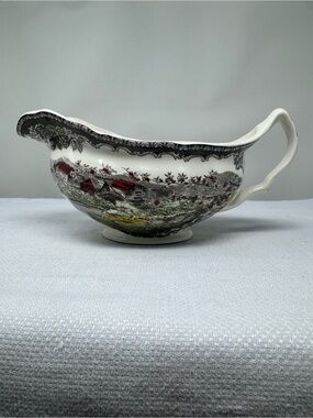 Ceramic gravy boat titled 'Friendly Village' by Johnson Brothers